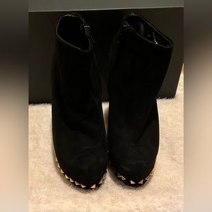 super high heel pumps with back spikes